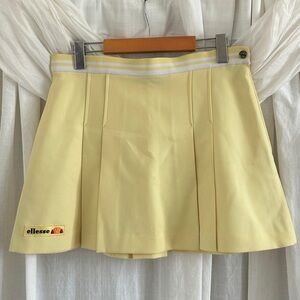 Vintage Ellesse Butter Yellow Pleated Mini Skirt